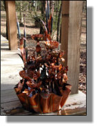 Large eight tiered copper fountain with irises
